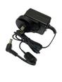 Black power adapter with plug and cable on a clear background