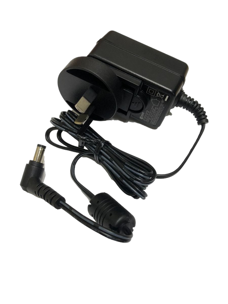 Black power adapter with plug and cable on a clear background