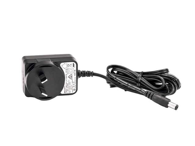 Black power adapter with fan and cable on a clear background