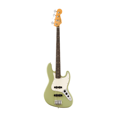 Green electric bass guitar on a white background